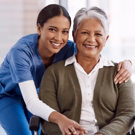 portrailt healthcare disability with nurse old woman wheelchair nursing home visit